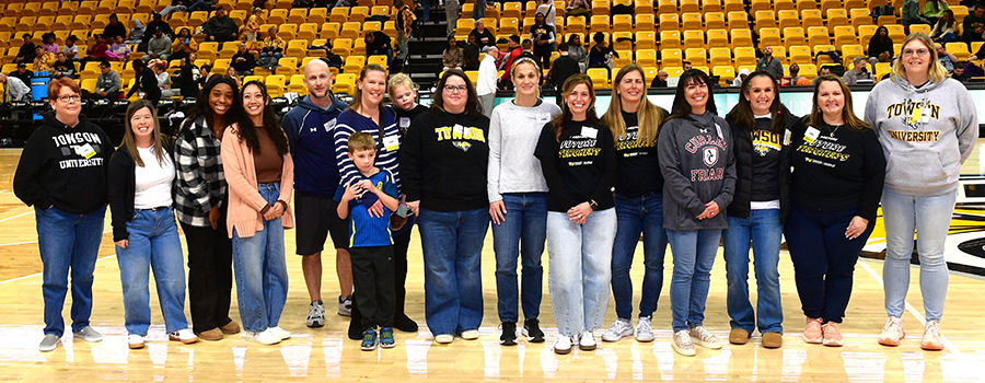 Mentors on court at 2026 Mentor Appreciation Night