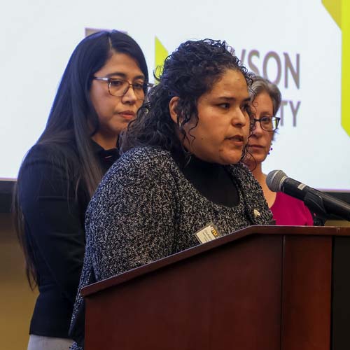 Students presenting at the armory