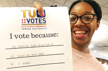 Young african american TU student saying why she votes